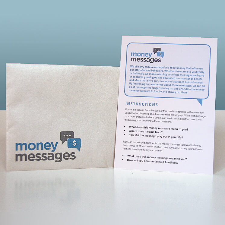 A card titled money messages stands next to an envelope. The card displays instructions about reflecting on personal messages and beliefs about money, with text in a blue and gray color scheme.
